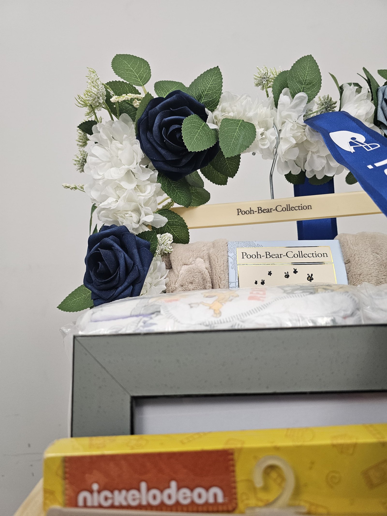 Blue baby boy gift basket close-up
