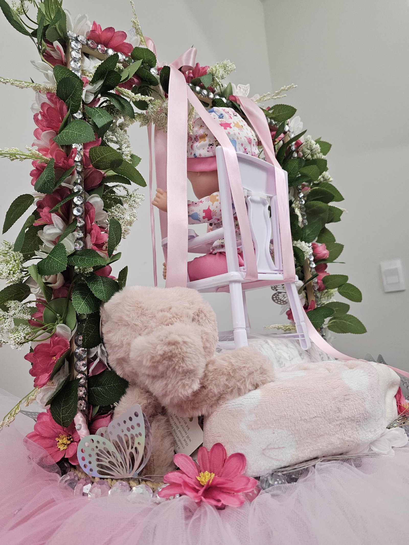 Close-up of pink baby girl gift basket